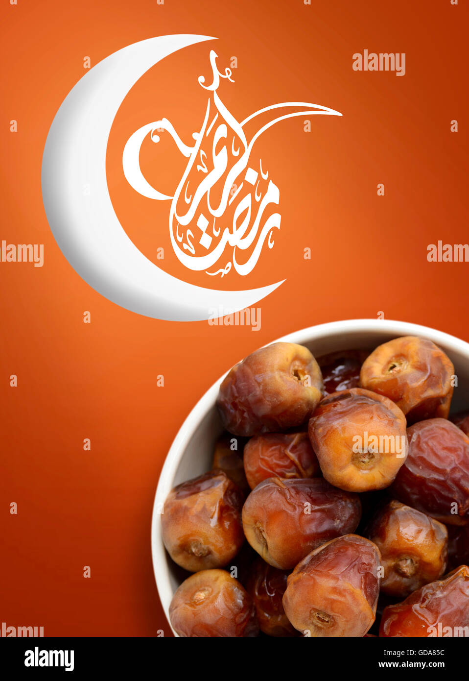 Ramadan Fasting Dates with Crescent over Vivid Background Stock Photo