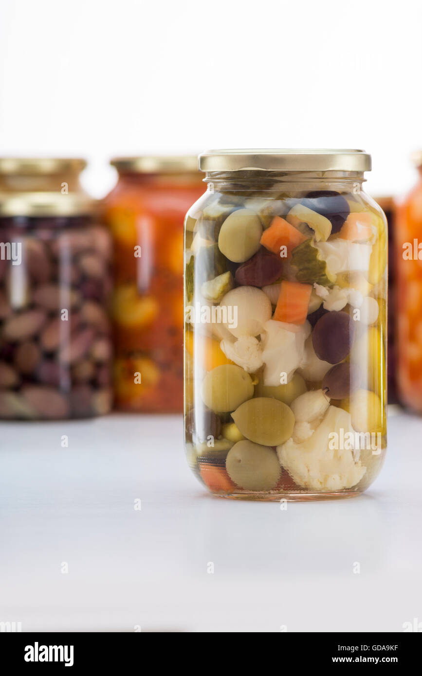 Pickled Vegetables Jar with Other Pickles Jars in Background Stock