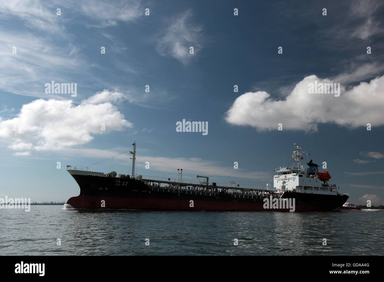 a oil freighter ship at the coast near the city of Bandar seri Begawan in  the country of Brunei Darussalam on Borneo in Southeas Stock Photo - Alamy