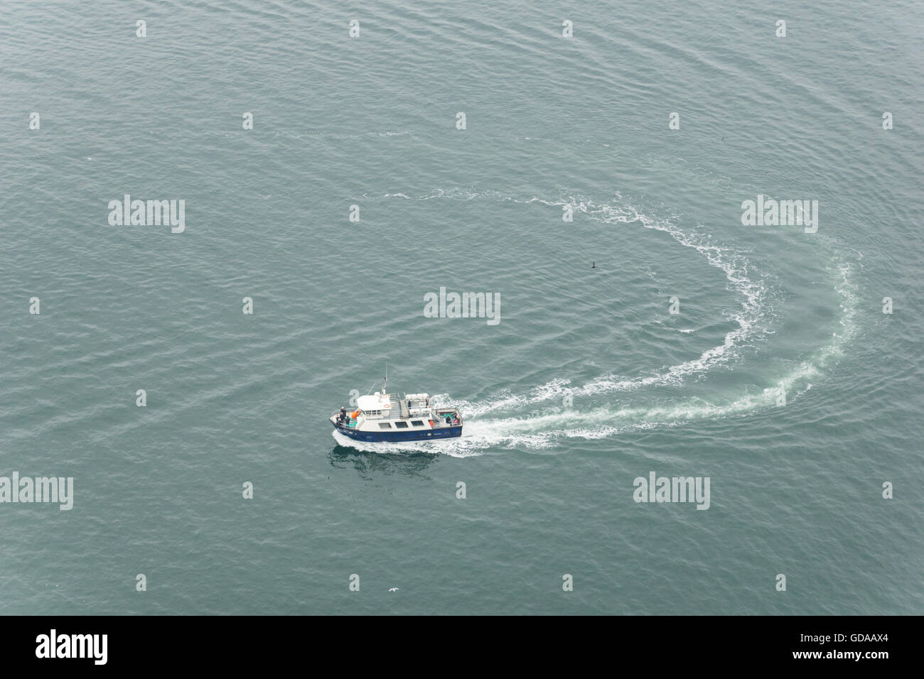 Ireland, County Clare, Cliffs of Moher, boat from above Stock Photo