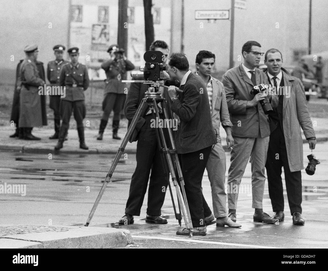 Jack Paar filming a report from Checkpoint Charlie Stock Photo - Alamy