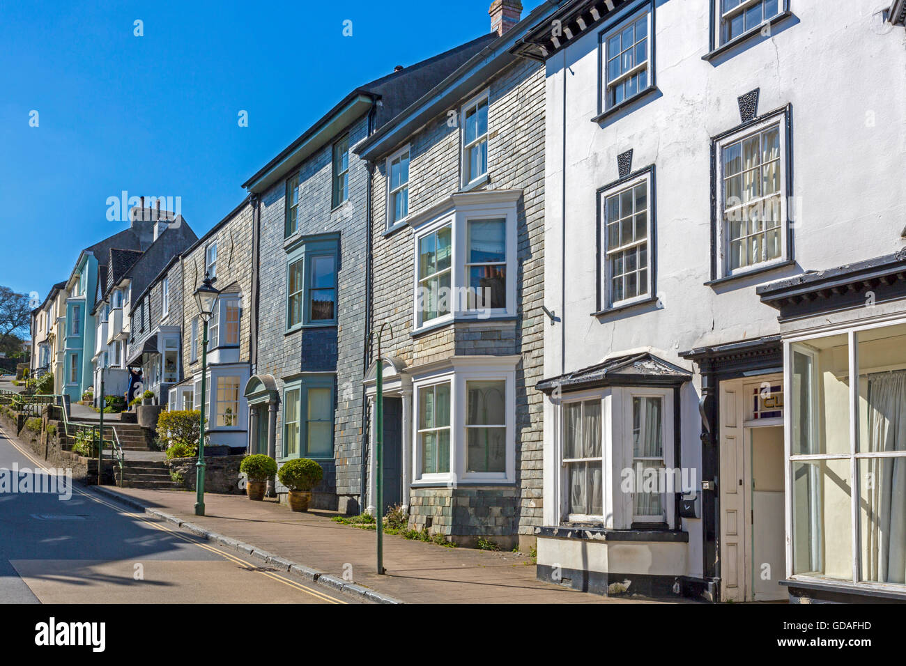 Slate clad houses in Church Street, the main road through Modbury, an