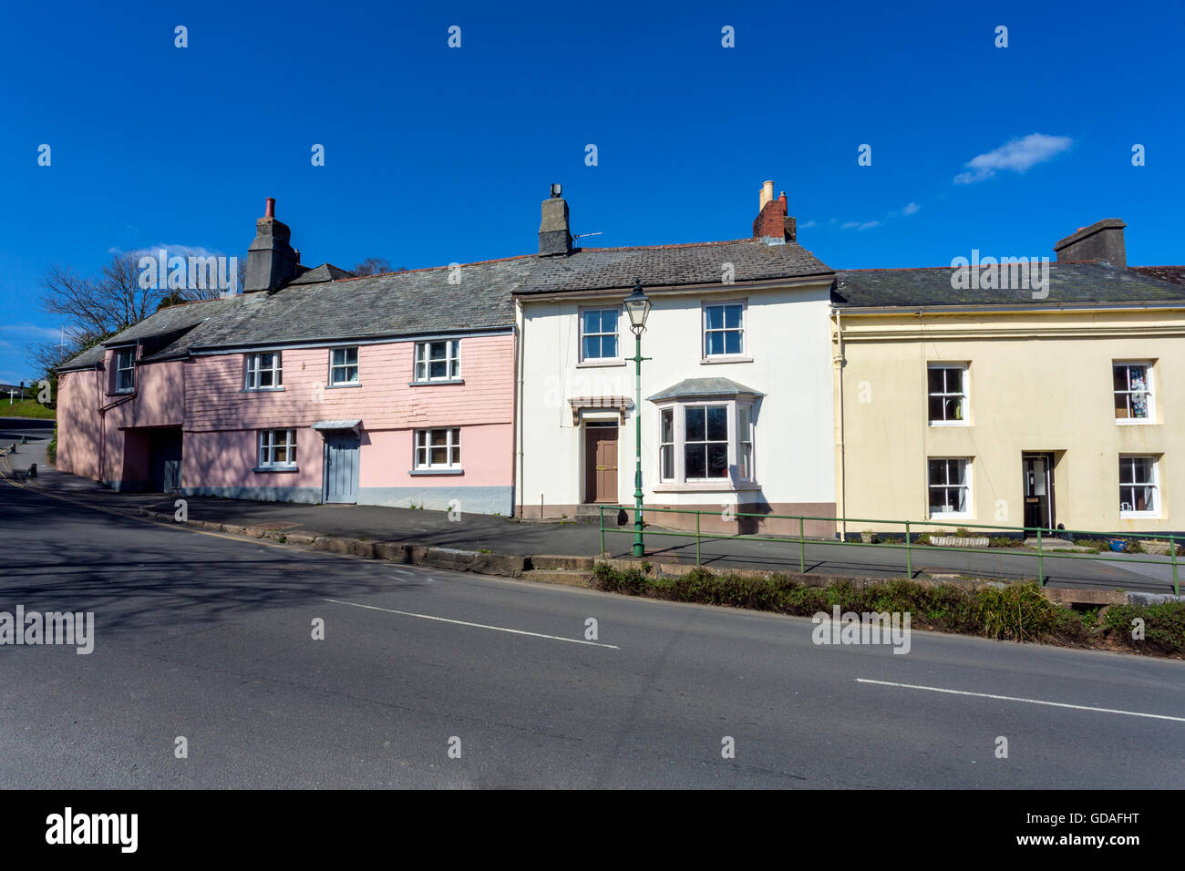 Colourful houses in Church Street, the main road through Modbury, an