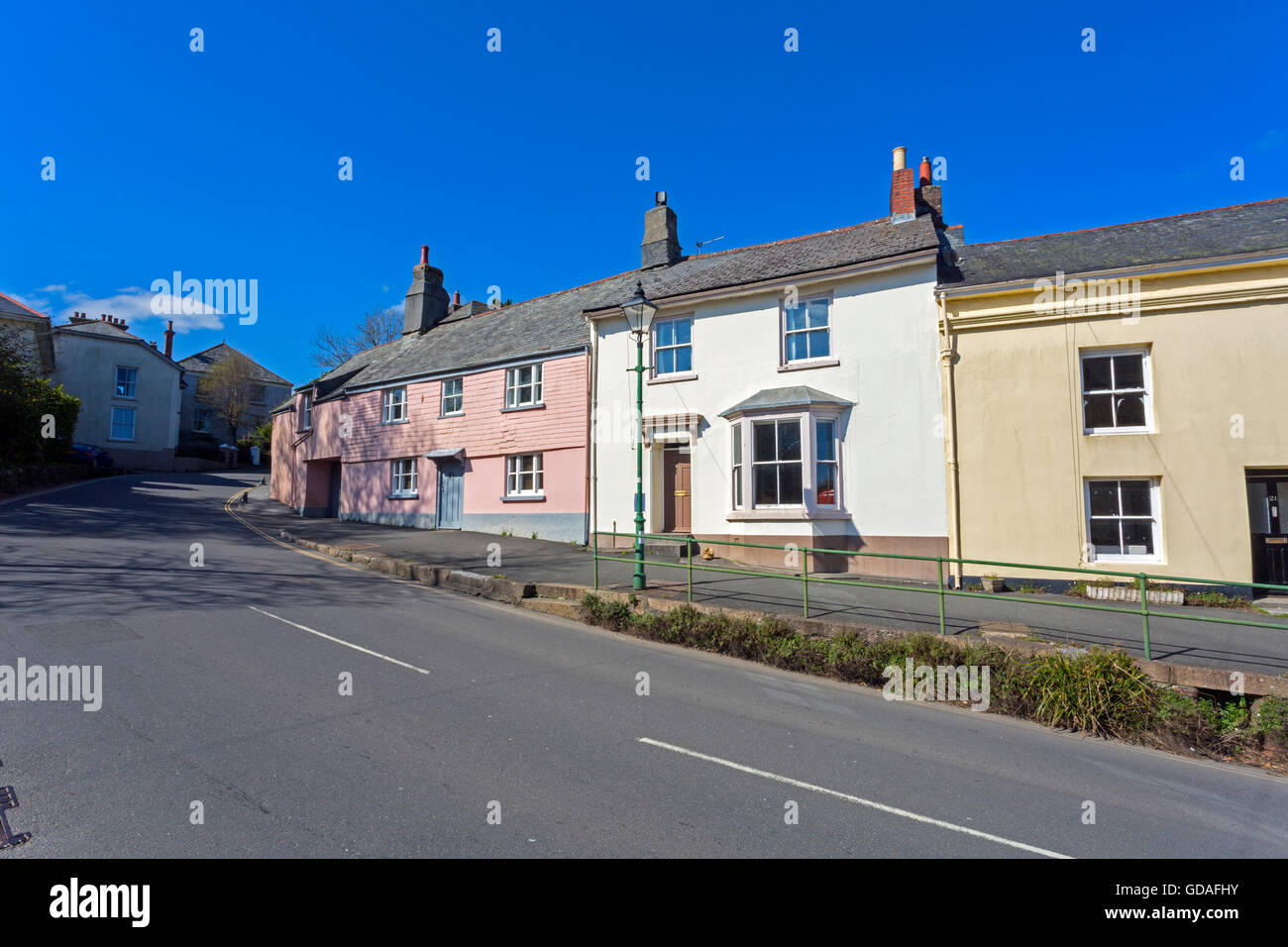 Colourful houses in Church Street, the main road through Modbury, an