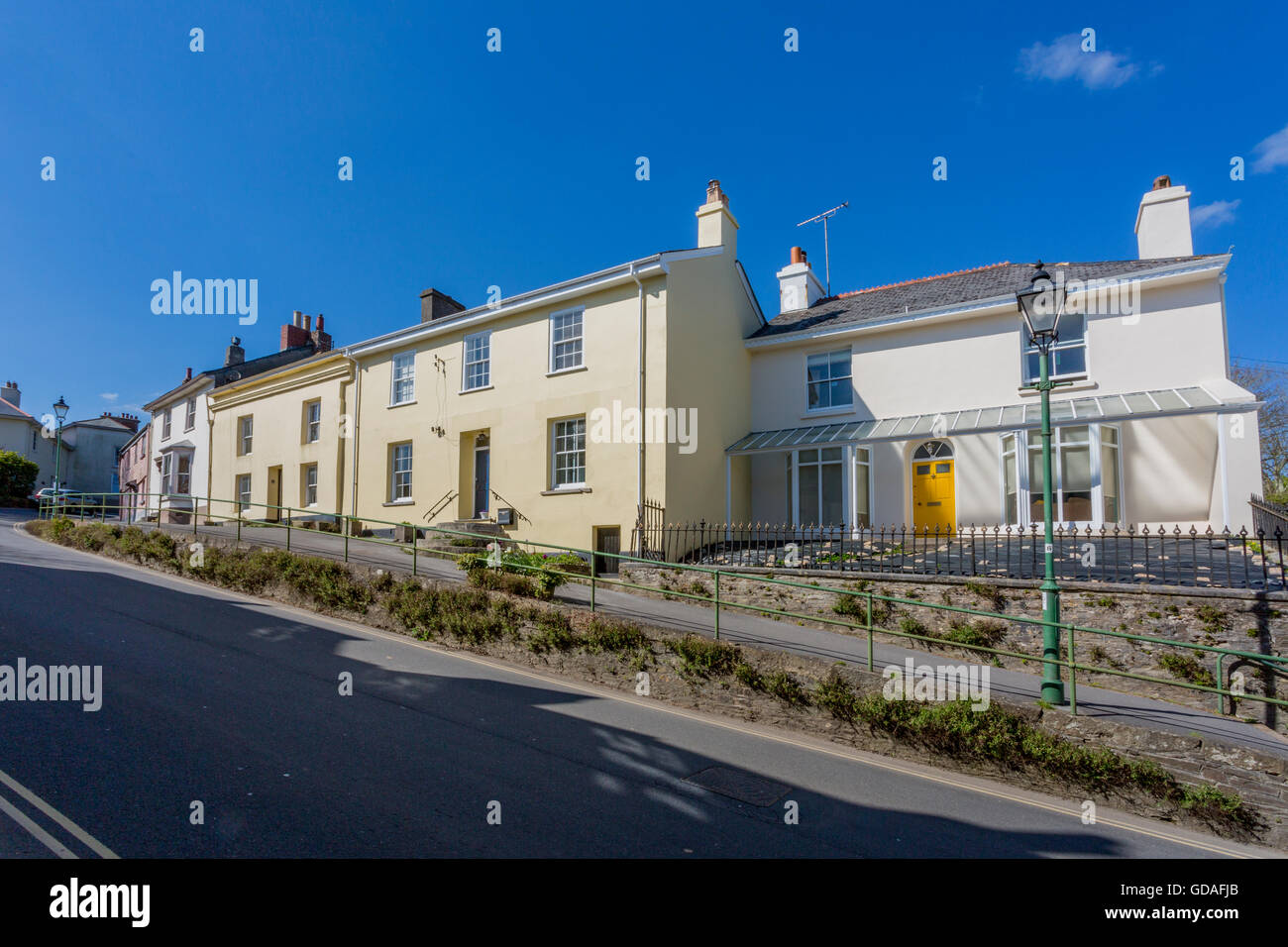 Colourful houses in Church Street, the main road through Modbury, an