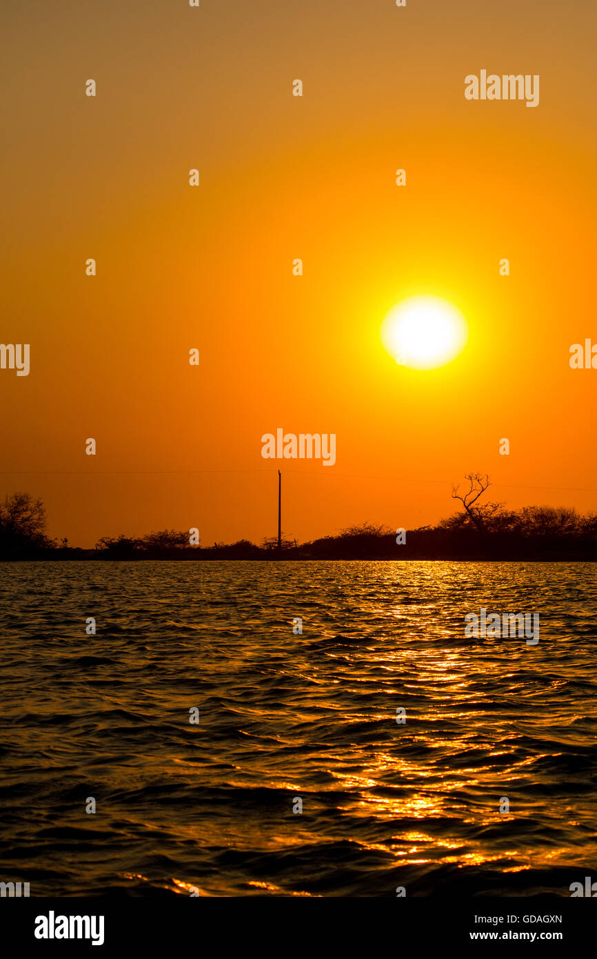 Sunset coming back from the Over water restaurant hut at La Paz, El salvador Stock Photo