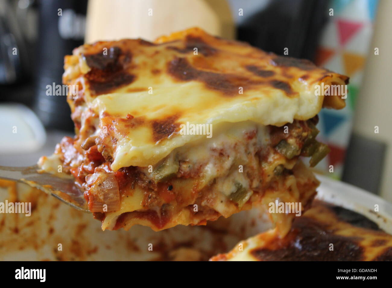Homemade lasagne, home cooking, homemade cheese sauce, bolognese sauce, mince, onions, peppers, garlic, Italian food Stock Photo