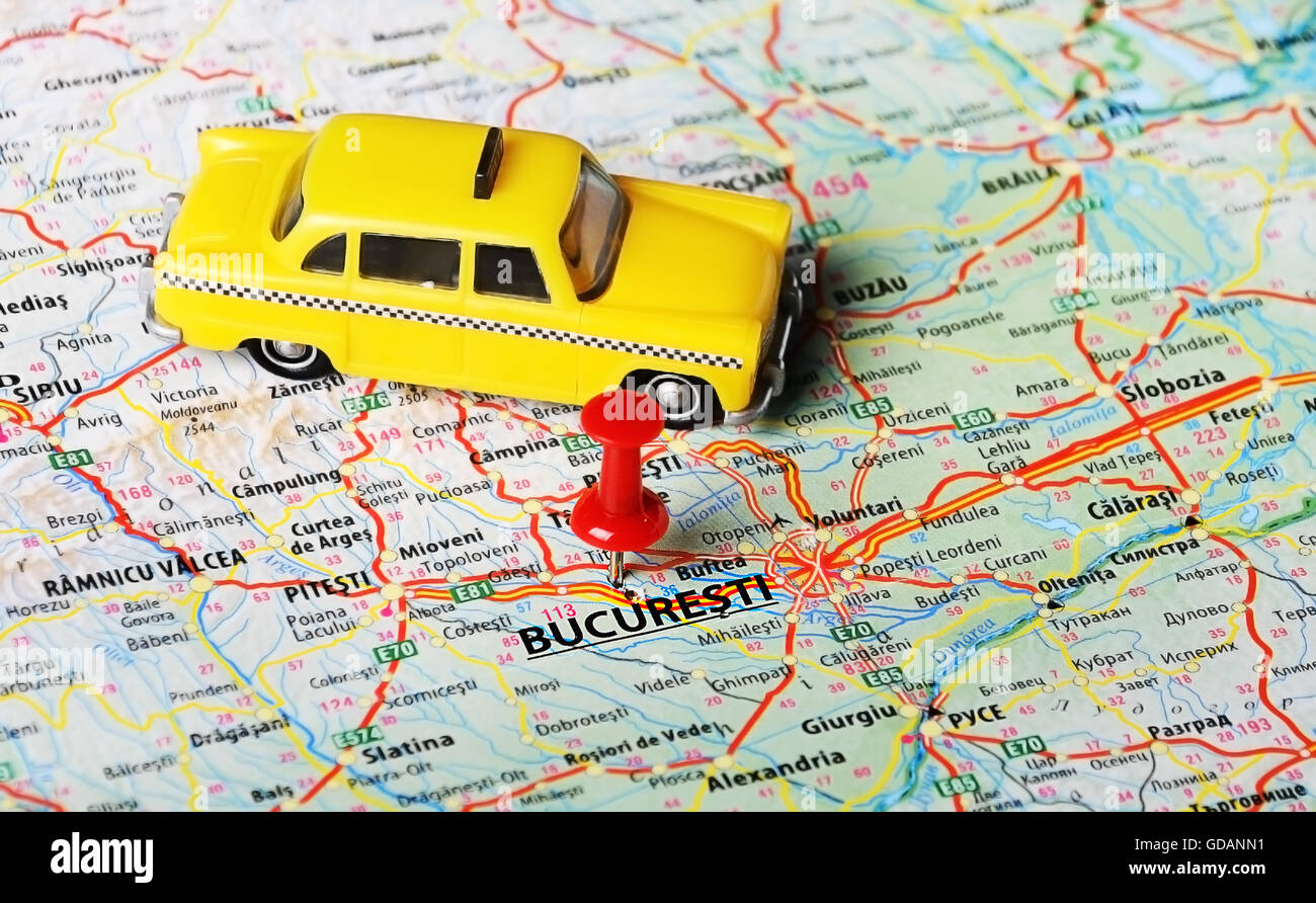 Close up of Bucuresti  ,Romania  mapand taxi car toy  - Travel concept Stock Photo