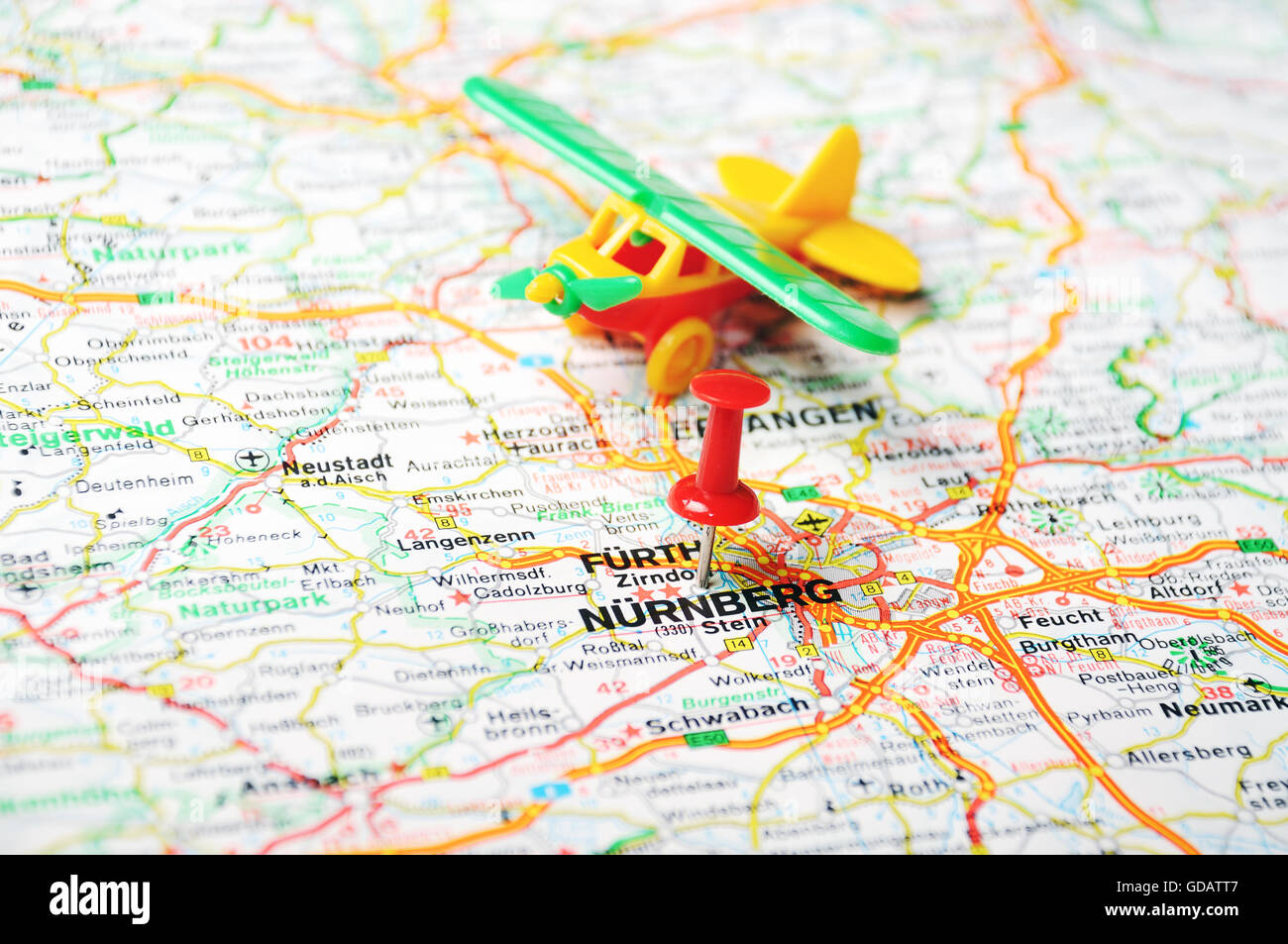 Close up of Nurnberg map with red pin and airplane - Travel concept ...