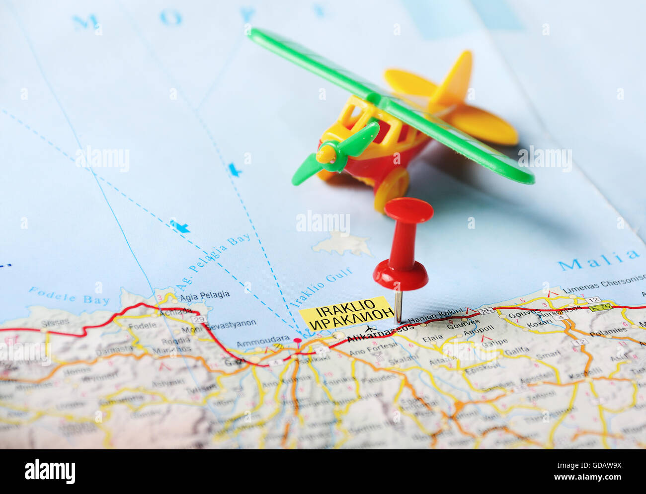 Close up of  Heraklion,Crete island Greece  map with red pin  and airplane - Travel concept Stock Photo