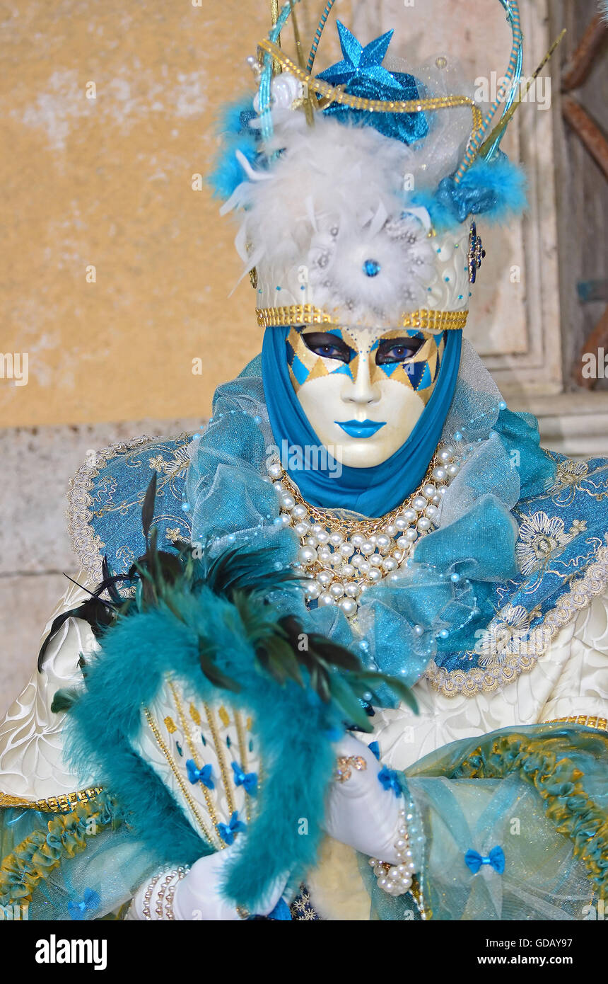 VENICE,ITALY - Beautiful blue feather and pearl costume at the 2015 Venice Carnival: Stock Photo