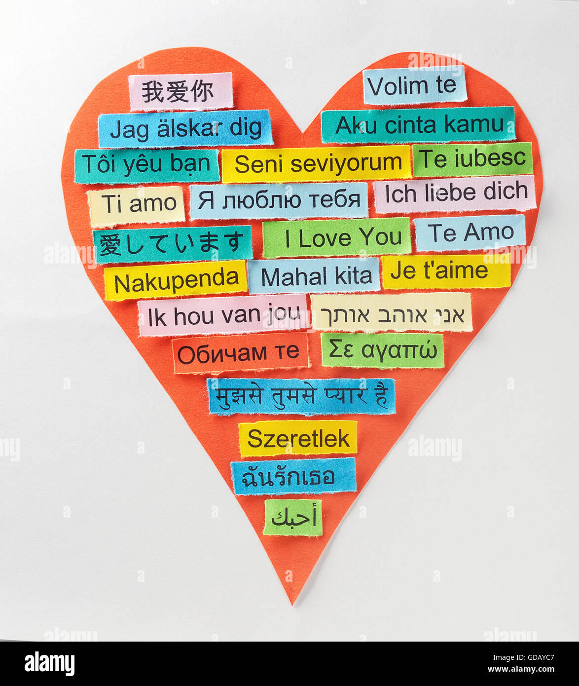 I Love You   Word Cloud printed on colorful paper in different languages on heart shape Stock Photo