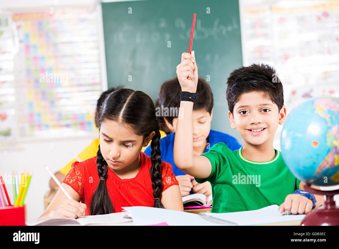 2 kids Girl and Boy Friends School Student Studying in a Classroom Stock  Photo - Alamy