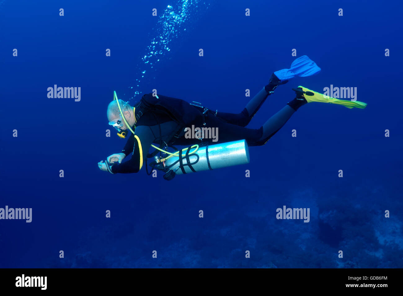 Male scuba diver with sidemount in blue water, Red sea, Egypt, Africa Stock Photo