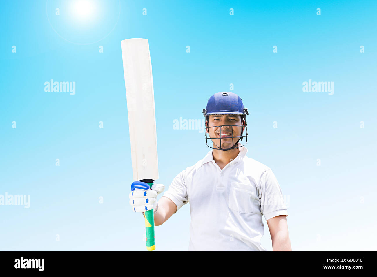 1 Indian Young man Cricketer Century Showing Bat Playing Cricket Sports Game Stock Photo