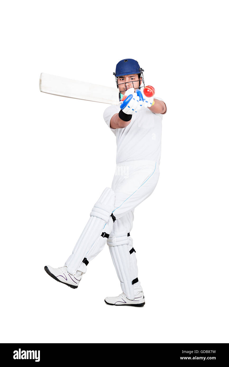 1 Indian Young man Sports Player Playing Cricket And Hitting Ball Stock Photo