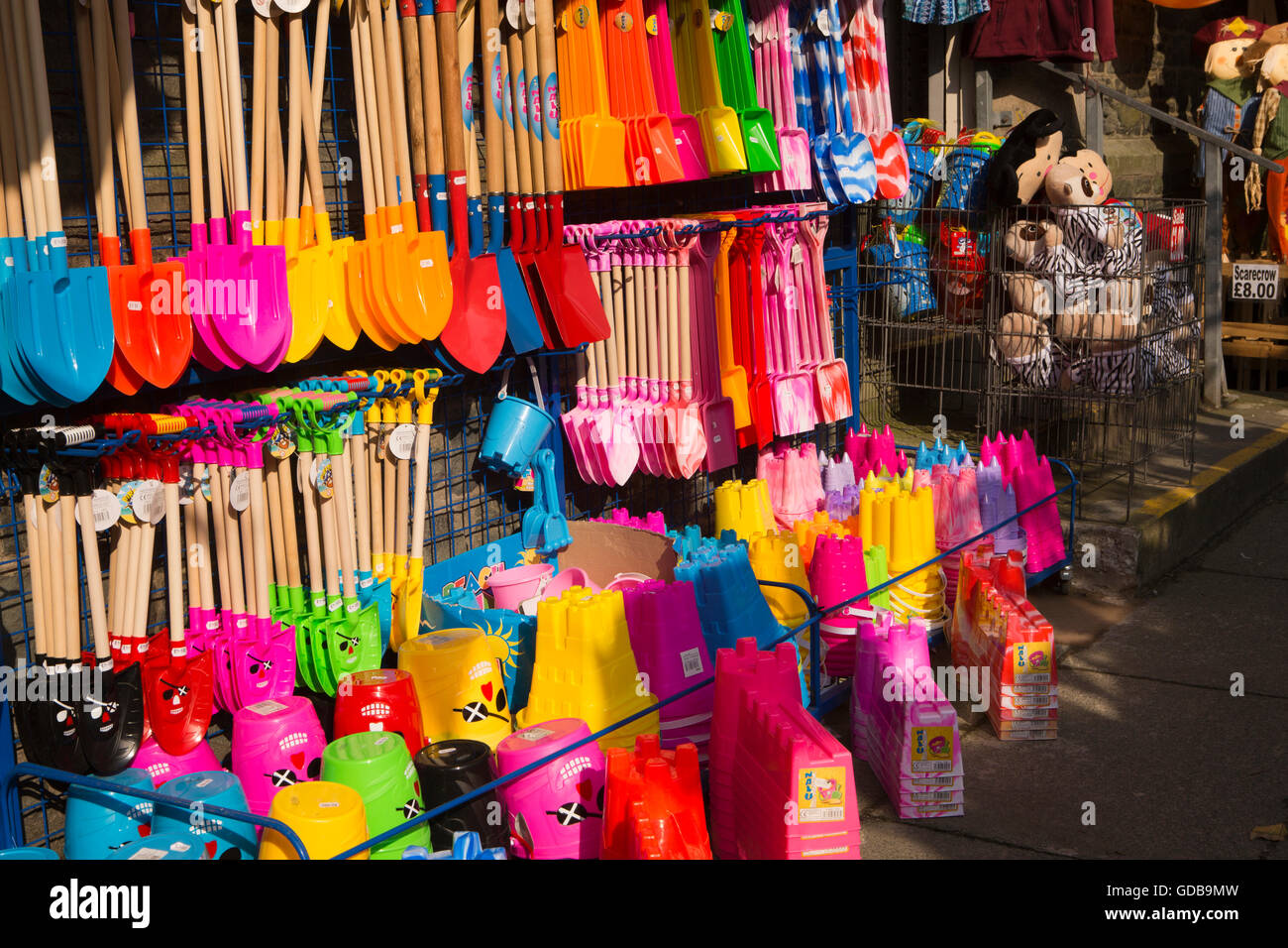 UK, Wales, Gwynedd, Barmouth, Beach Road, beach supplies shop, colourful plastic toys on display