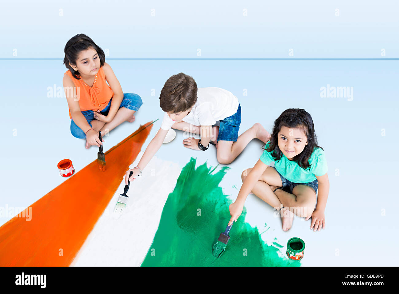 3 indians Kids friends Independence Day Flag Painting Stock Photo