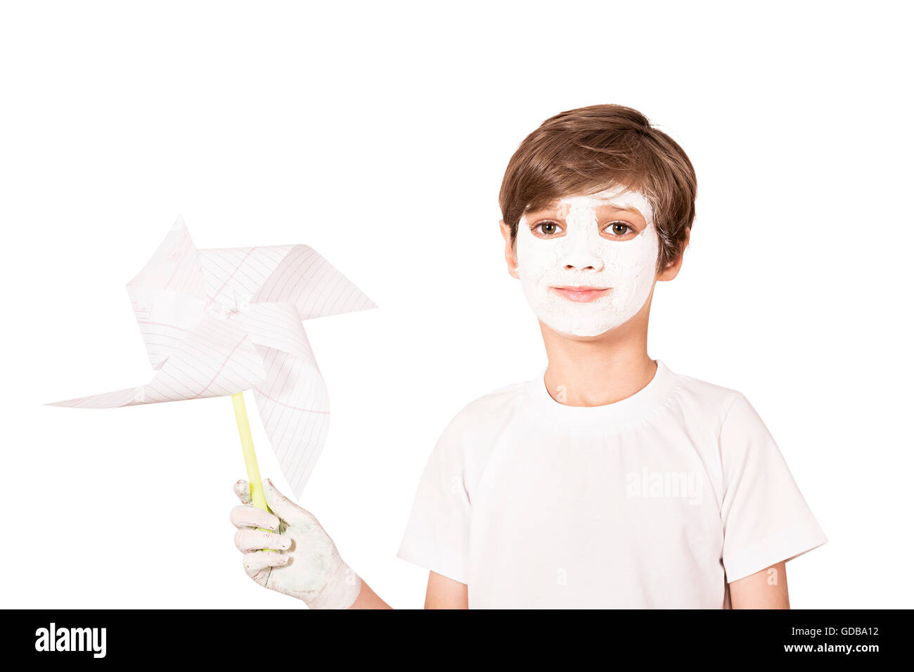 1 indian Kid boy face paint Standing and showing Pinwheel Stock Photo