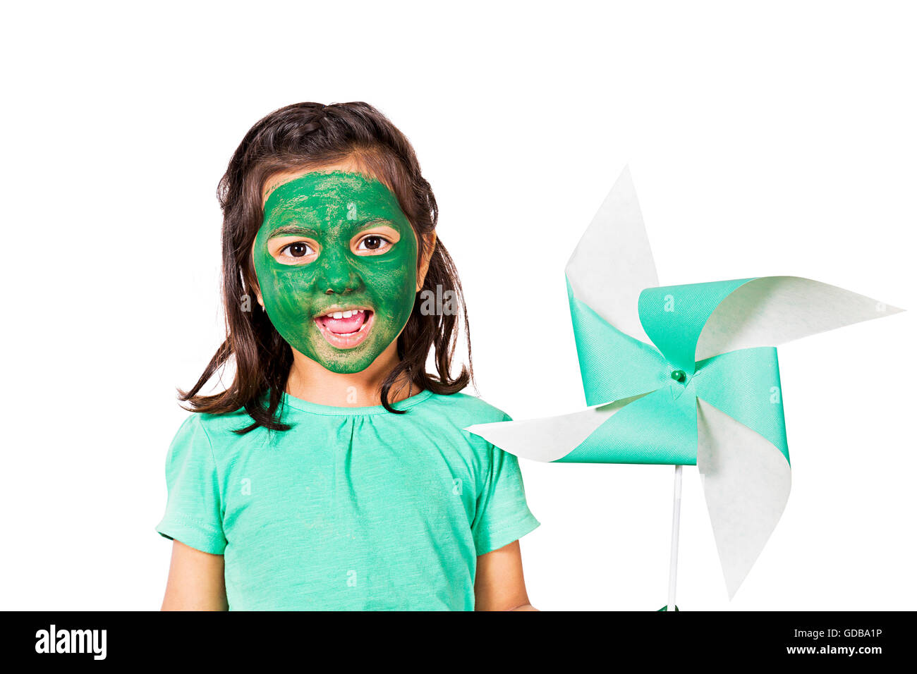 1 indian Kid girl face paint Standing and showing Pinwheel Stock Photo