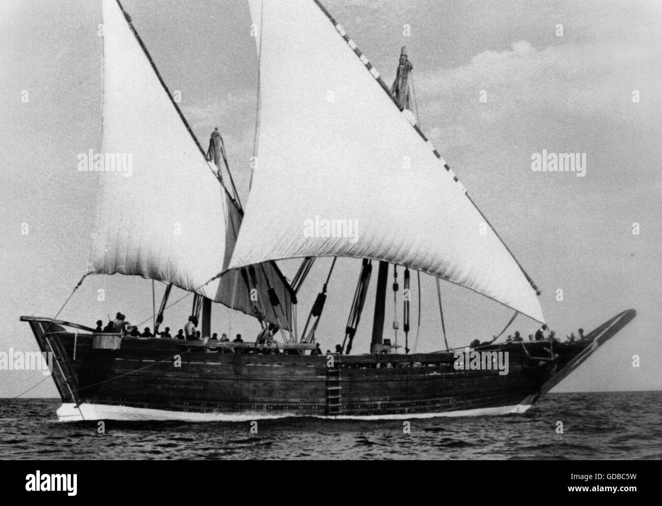 AJAX NEWS PHOTOS. 9TH DEC, 1980. MUSCAT, OMAN. - THE 90 FOOT (27M) REPLICA OF AN ARAB 'GANJA' - THE SOHAR, WHICH SAILED FROM MUSCAT LAST 23/11/80 ON THE FIRST LEG OF AN EXPEDITIONARY VOYAGE TO CHINA UNDER THE COMMAND OF TOMOTH SEVERIN IN AN ATTEMPT TO FOLLOW IN THE WAKE OF LEGENDARY SINBAD THE SAILOR. THE TIMBER BUILT VESSEL IS STITCHED TOGETHER USING OVER 400 MILES OF SPECIALLY PREPARED COCNUT ROPE AND WAS HAND CRAFTED BY 32 SHIPRIGHTS IN SUR, OMAN. SEVERIN WILL MAKE A STOP AT THE MALDIVE ISLANDS IN JAN 1981.  PHOTO:AJAX NEWS & FEATURE SERVICE  REF:SHH SOHAR DHOW 80 Stock Photo