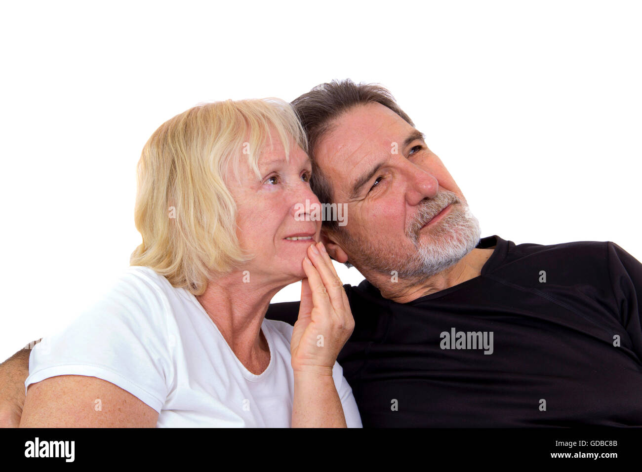 old senior couple look up isolated on white Stock Photo