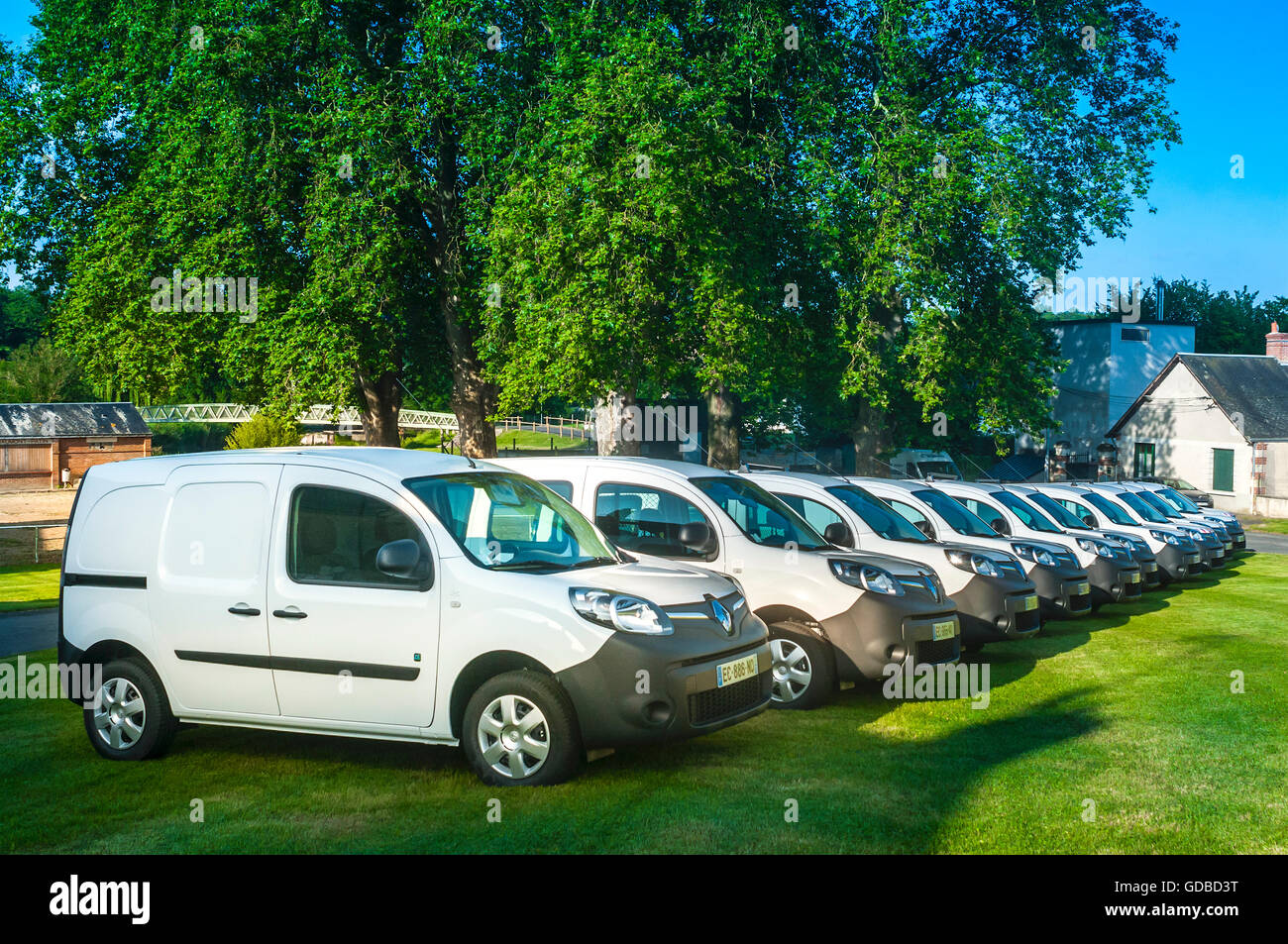 Line of ten Renault ZE Electric vans - France Stock Photo - Alamy
