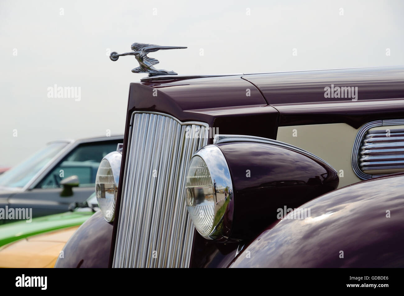 Front part of the vintage car with a hood ornament Stock Photo