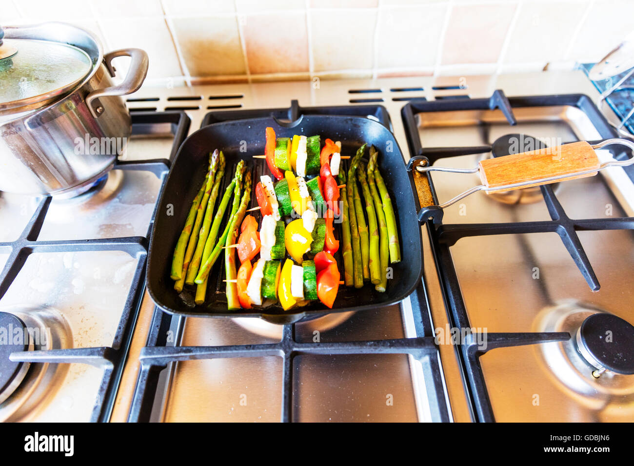 Griddled vegetables in griddle asparagus peppers courgettes and
