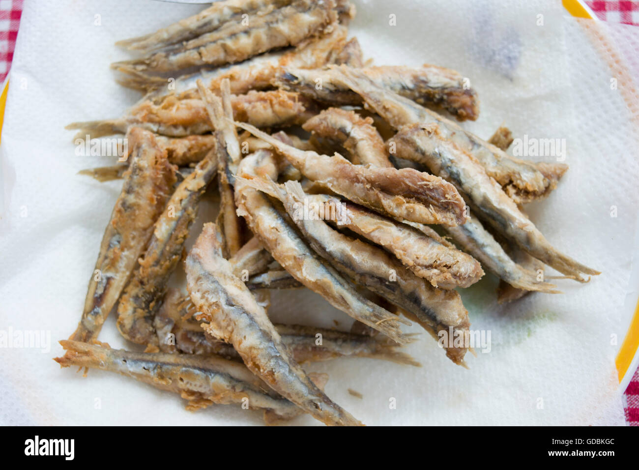 whole anchovies battered and fried in olive oil Stock Photo Alamy