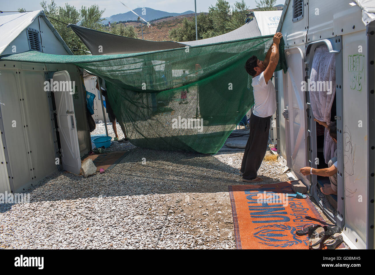 shades being distributed by Boat Refugee Foundation in Kara Tepe refugee camp in Greece Stock Photo