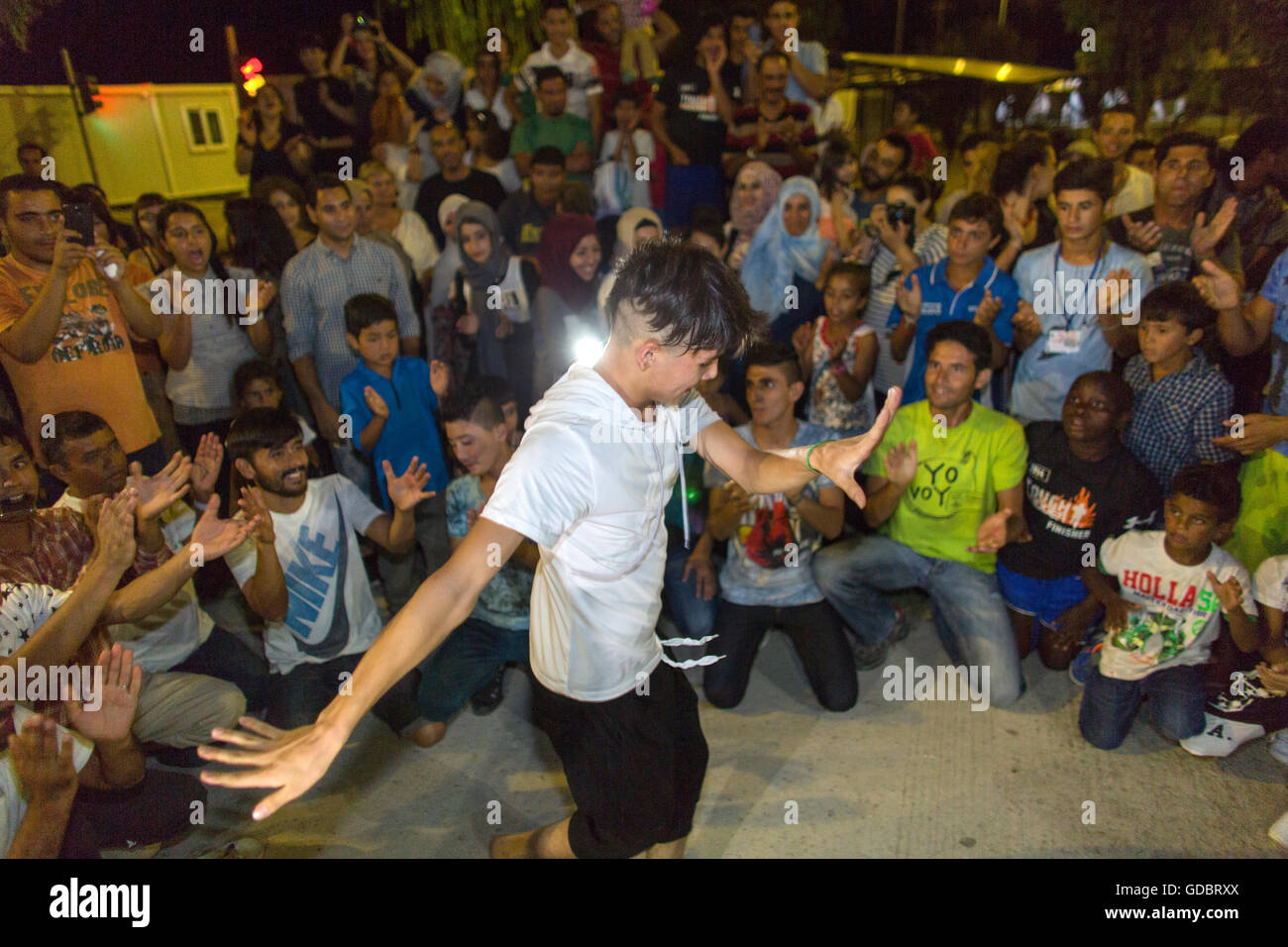 Syrian, Iraqi and Afghan refugees celebrate Eid, the end of Ramadan in Kara Tebe refugee camp, Greece Stock Photo