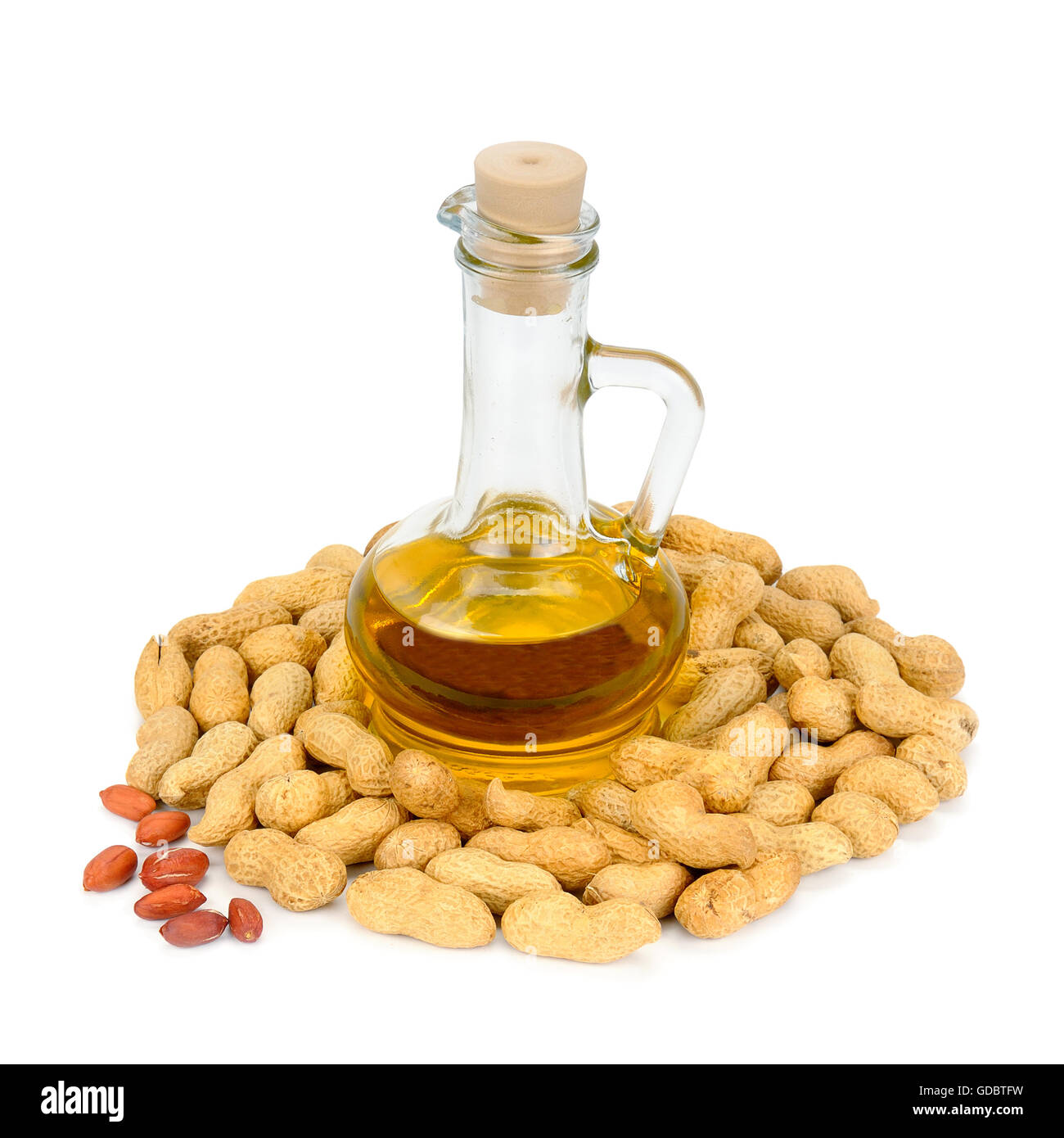 peanuts and oil in bottle isolated on white background Stock Photo
