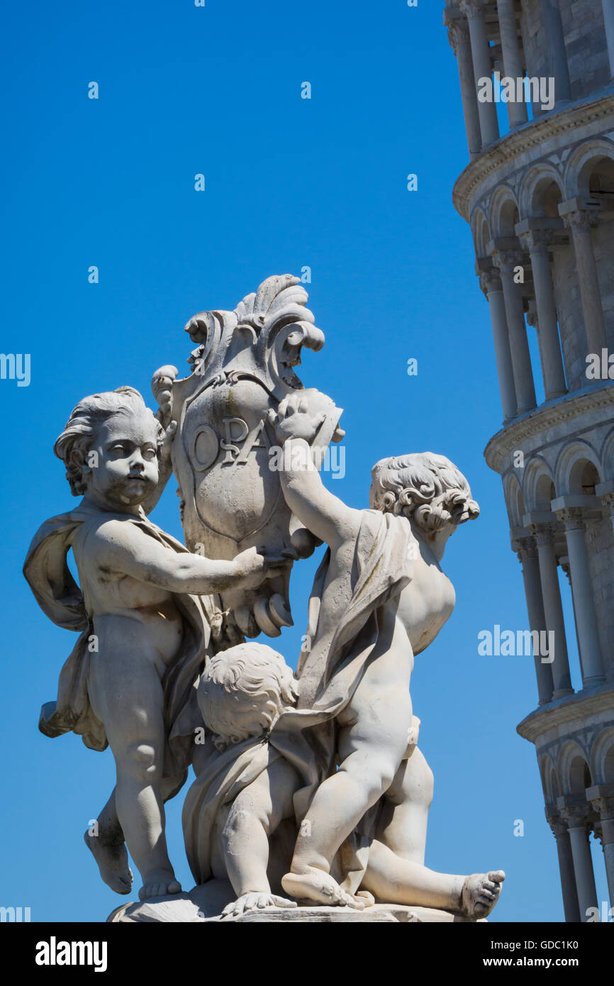 Pisa, Pisa Provence, Tuscany, Italy.  La Fontana dei Putti, or Cherub Fountain in front of the leaning tower of Pisa. Stock Photo
