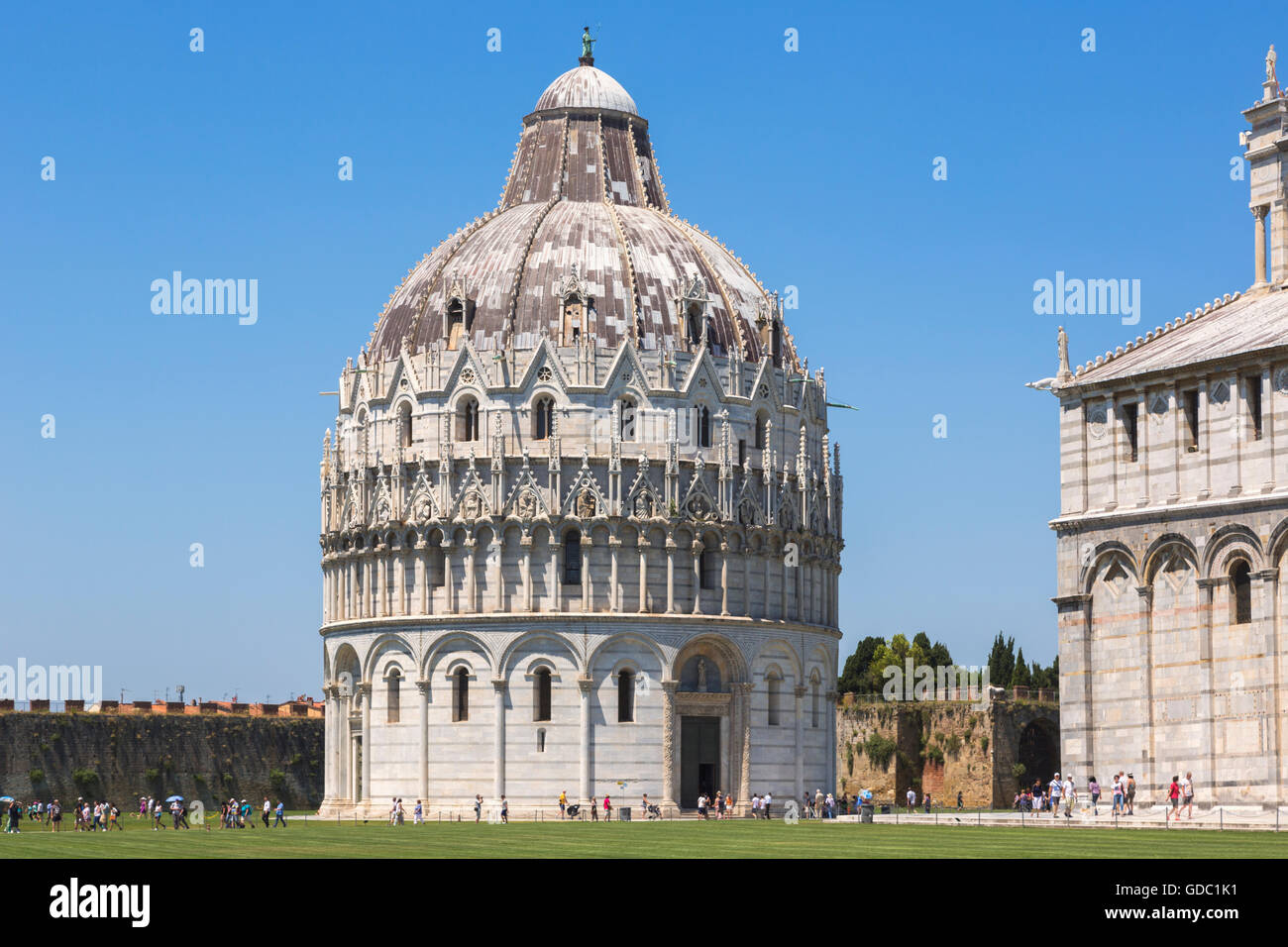 Pisa, Pisa Province, Tuscany, Italy. The Baptistery in the Campo dei Miracoli, or Field of Miracles.  Aka Piazza del  Duomo. Stock Photo