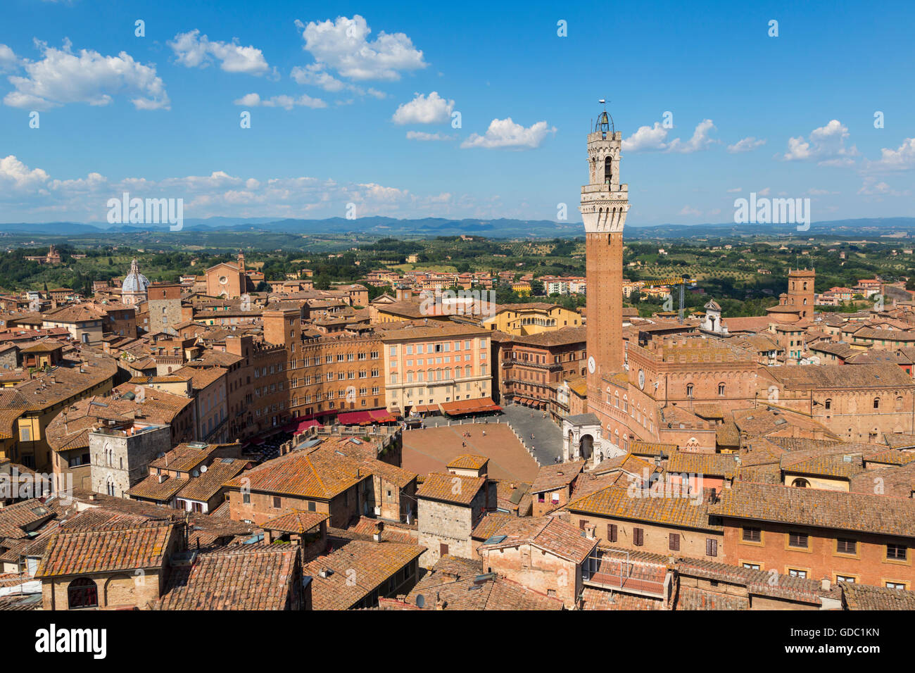 Siena, Siena Province, Tuscany, Italy.  Piazza del Campo and Torre del Mangia.  High view. Stock Photo