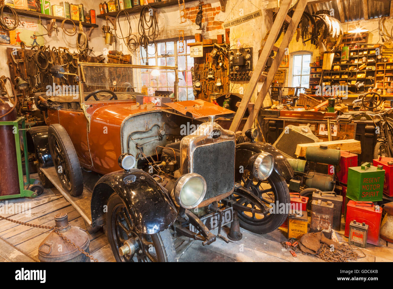 England Hampshire New Forest Beaulieu The National Motor Museum Exhibit Of Historical Garage Workshop Stock Photo Alamy