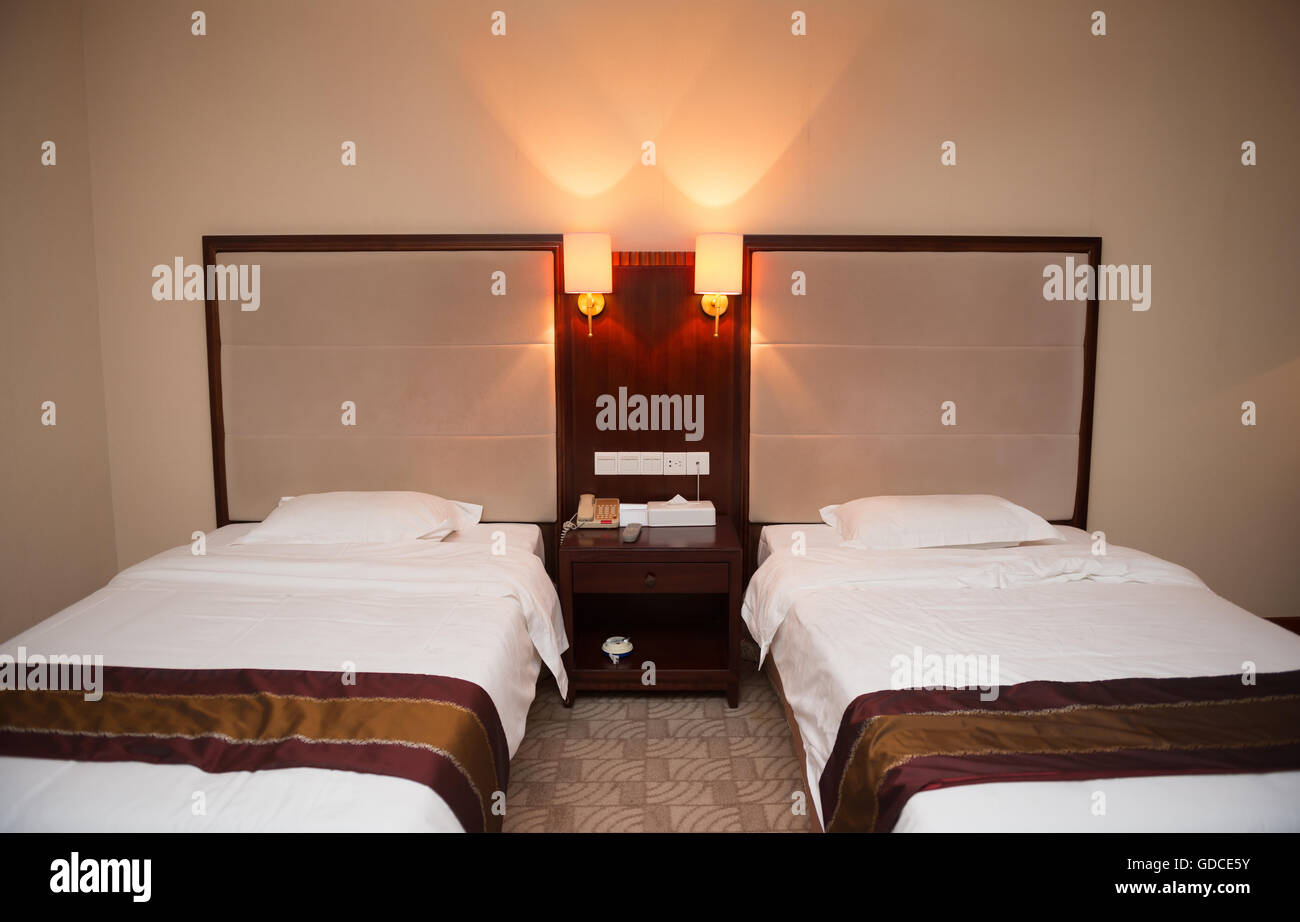 two beds in a hotel room Stock Photo Alamy