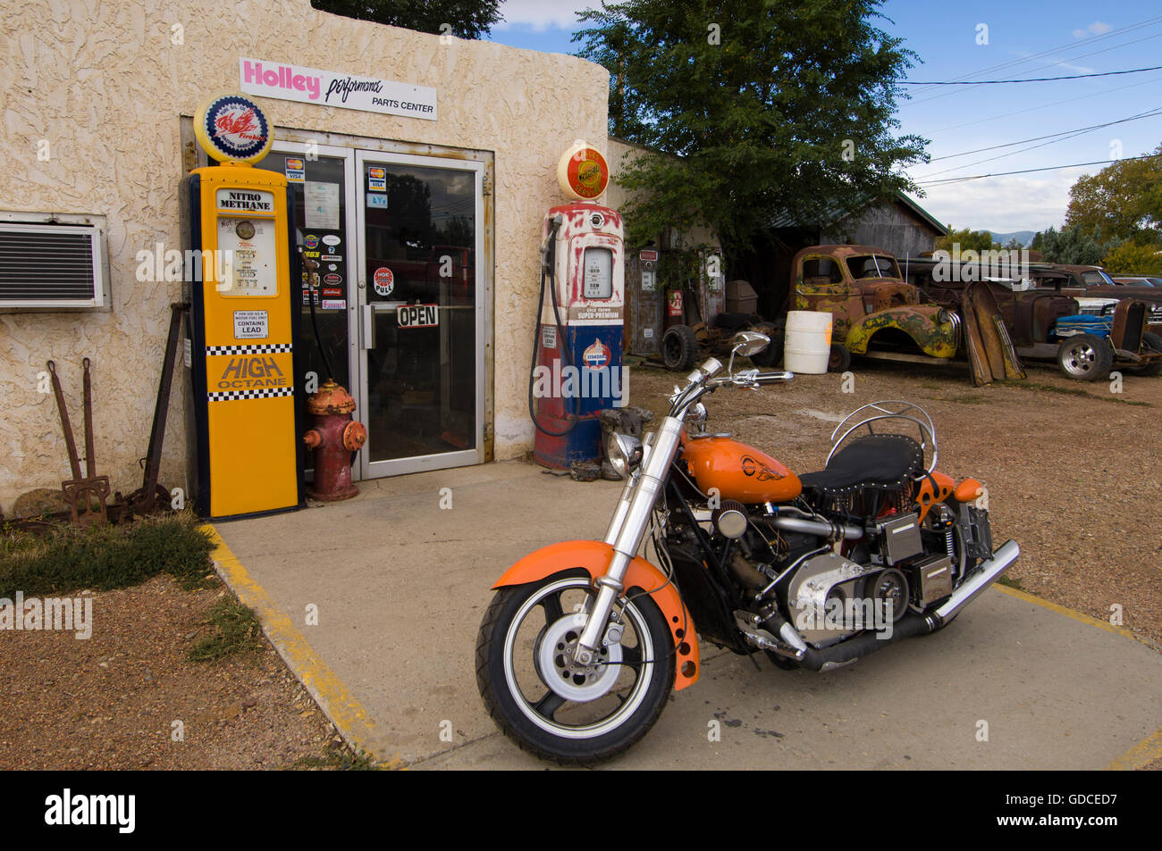 Harley Davidson in front of filling station, Sheridan, Wyoming, USA, America Stock Photo