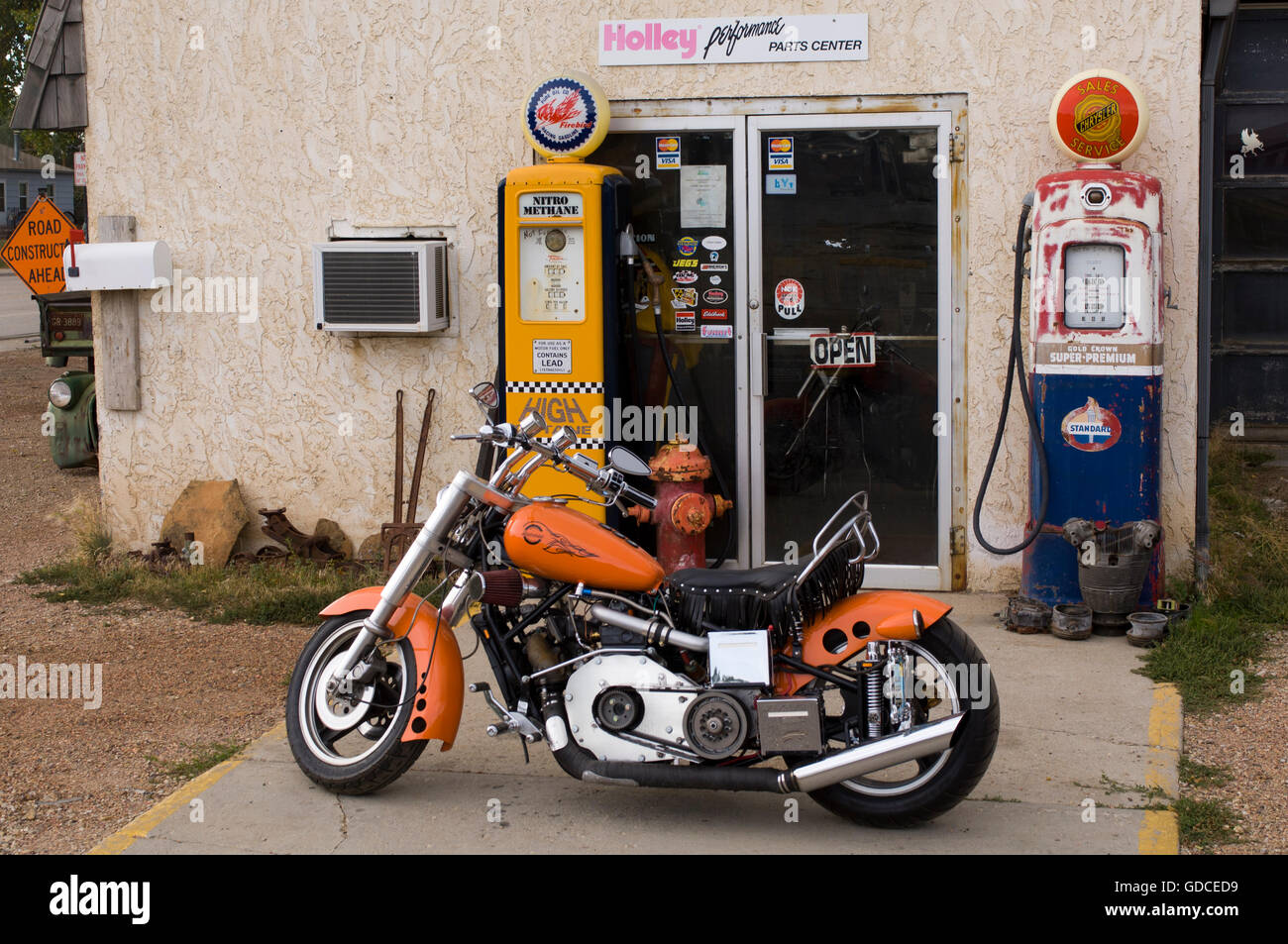 Harley Davidson in front of filling station, Sheridan, Wyoming, USA, America Stock Photo