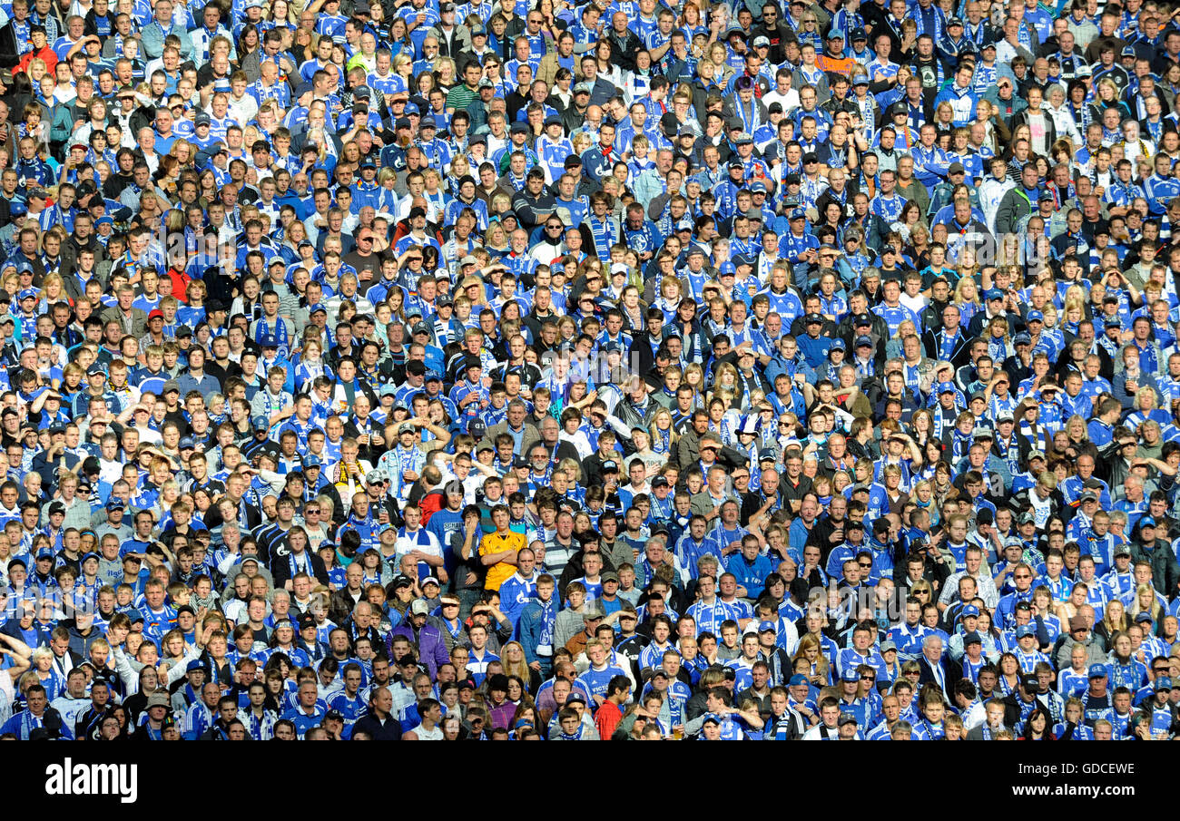 Masses of fans in the fan block, German Soccer League, season 2010-2011, 6. round, FC Schalke 04 - Borussia Moenchengladbach 2-2 Stock Photo