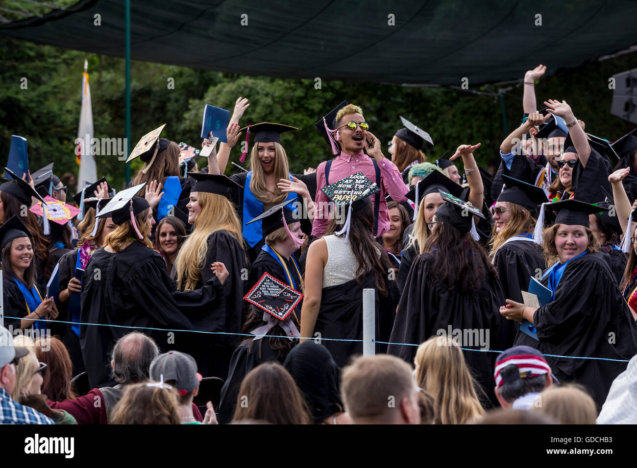 university students attending graduation ceremony at Sonoma State University in Rohnert Park in Sonoma County in California United States Stock Photo