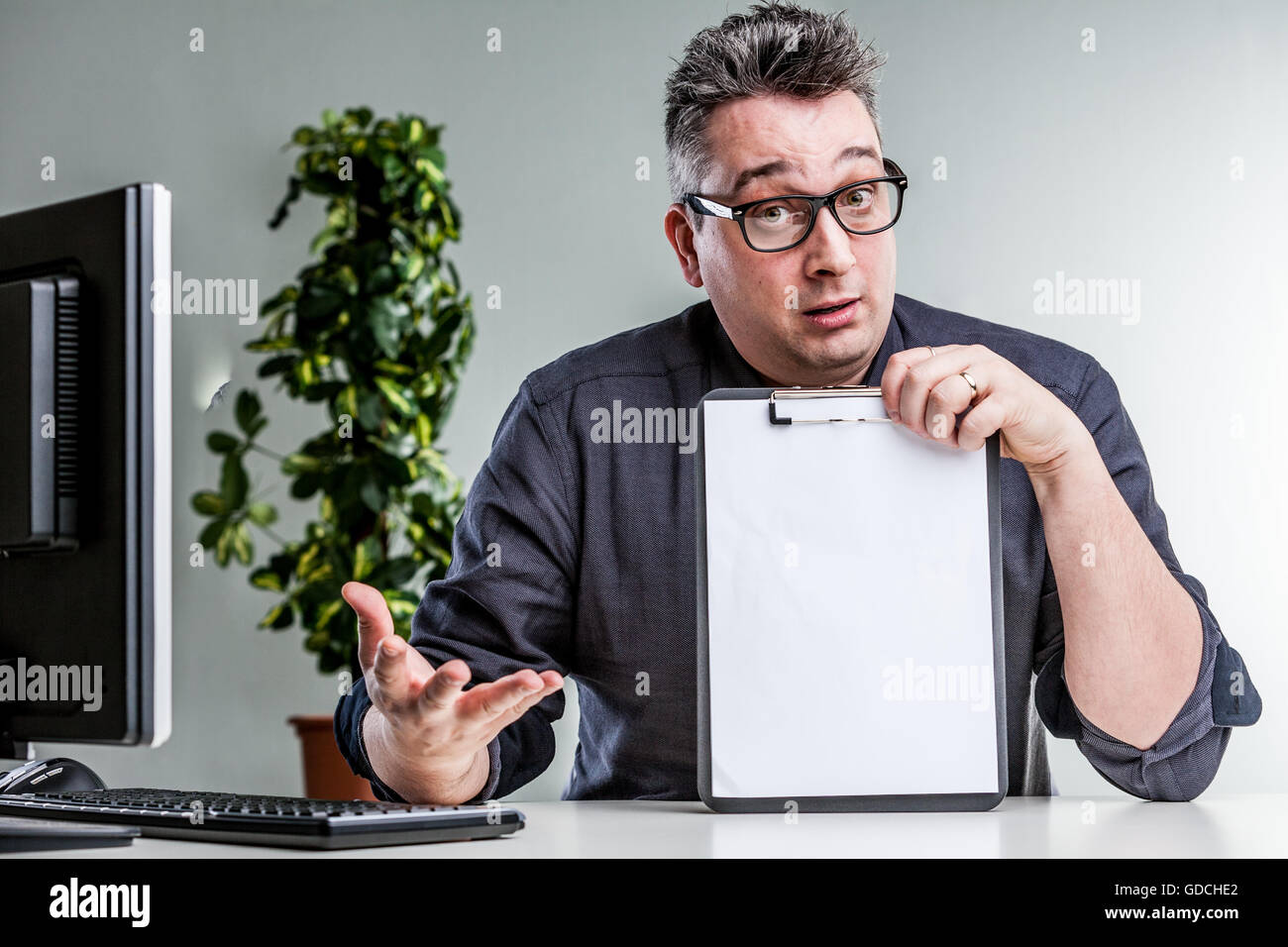 expert office worker or professor explaining and showing what's the problem Stock Photo