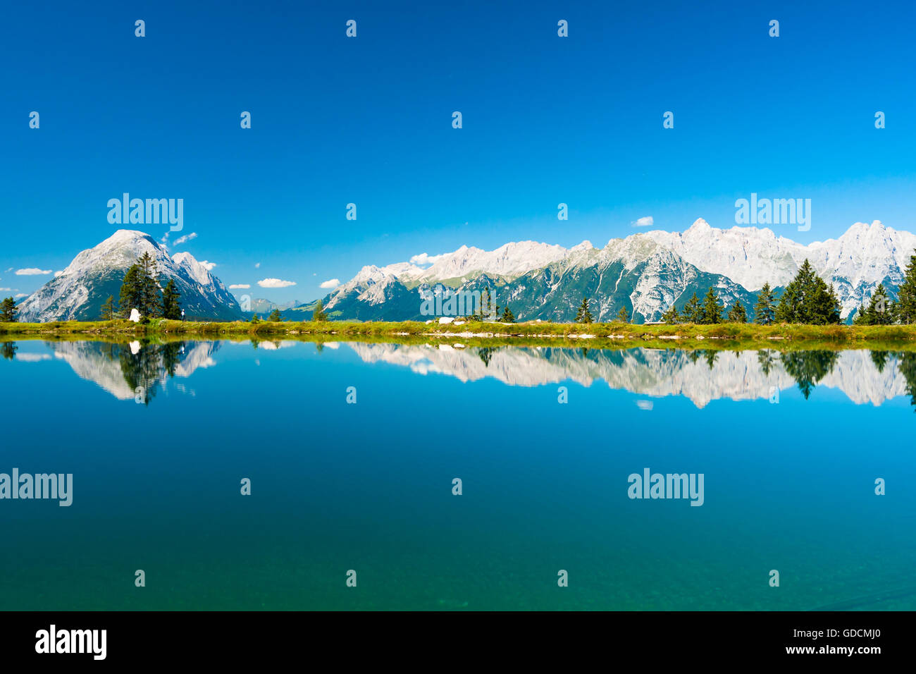 Perfect view on Kaltwassersee in Seefeld in Tirol and mountains at distance Stock Photo