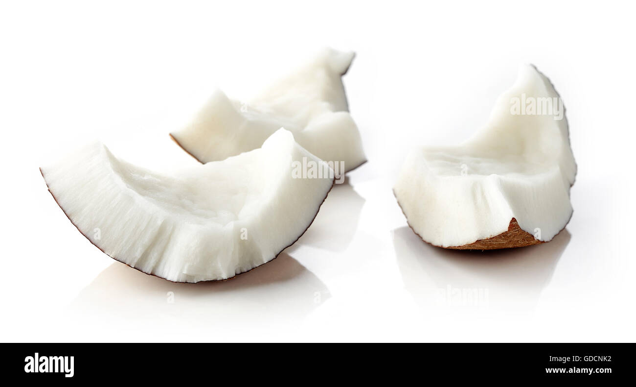 Coconut pieces isolated on white background Stock Photo