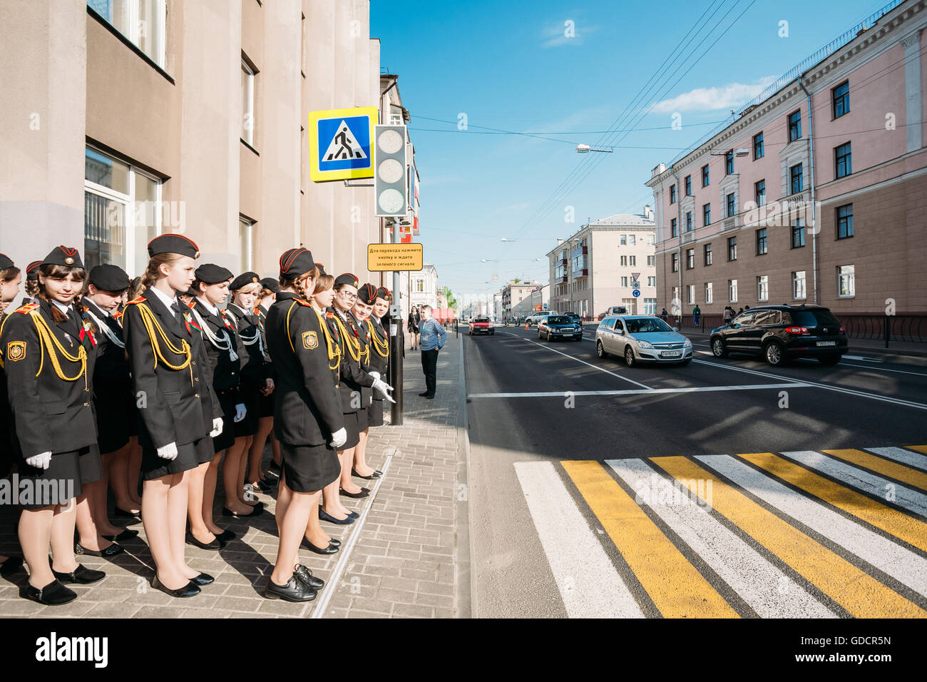 The Formation Of Young Girls In Cadet Unform Of Gomel State Cadet School By Crosswalk. Preparing For The 9th May Victory Parade Stock Photo