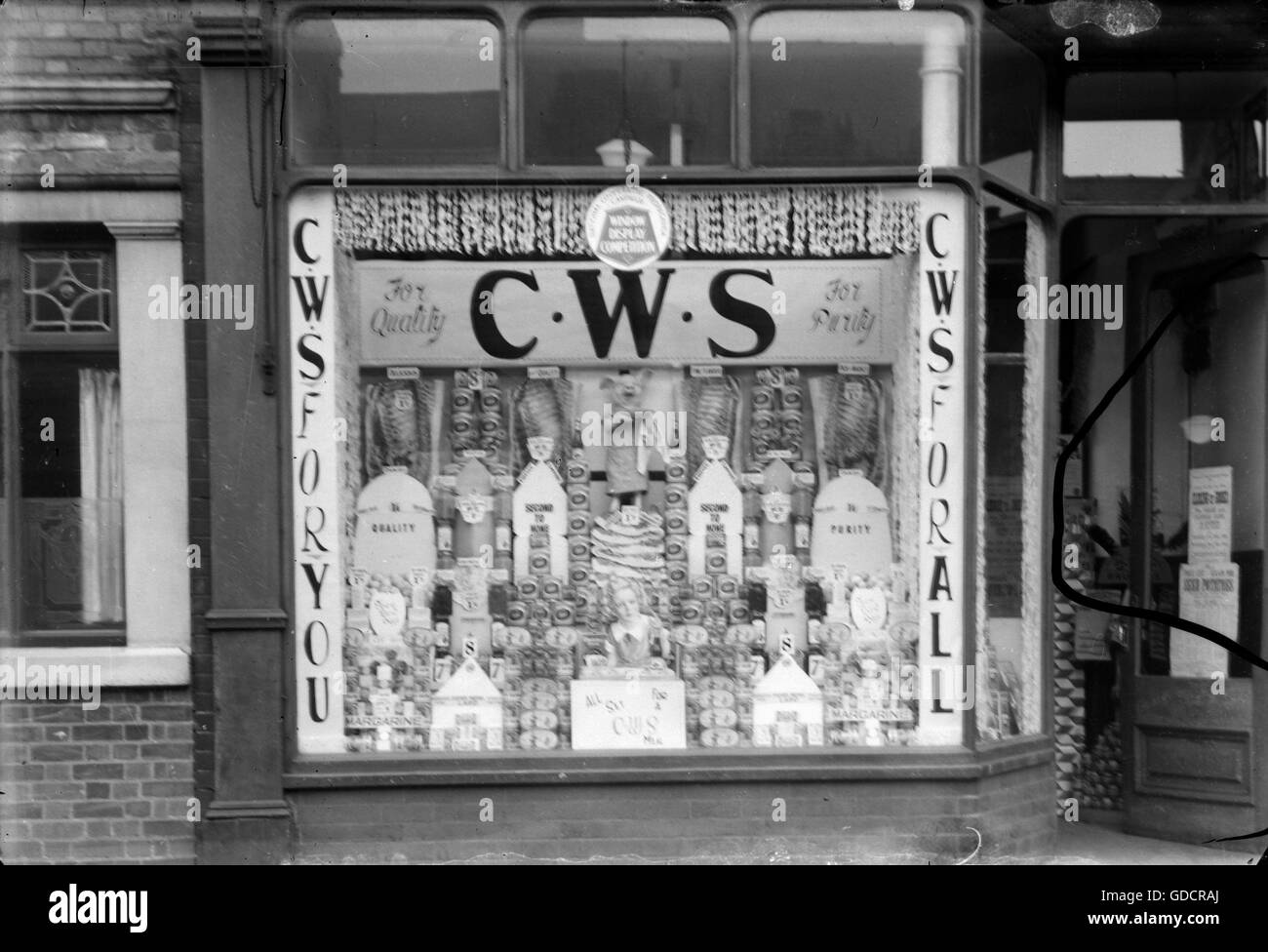 Shop Window display for The Co-op Co-operative Wholesale Society (CWS) circa 1920 in the Burton on Trent area, South Derbyshire. Photograph by Tony HenshawTony Henshaw Stock Photo