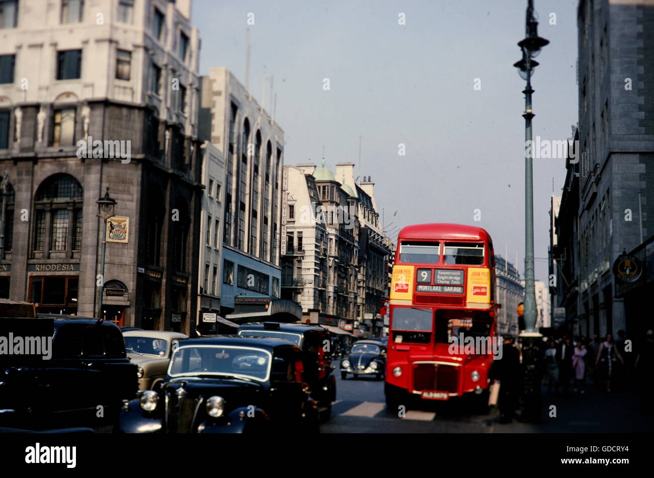 The Strand, London with Routemaster double decker bus and cars and showing the Civil Service Stores and the High Commission of Southern Rhodesia in 1964. Photograph by Tony Henshaw. Stock Photo