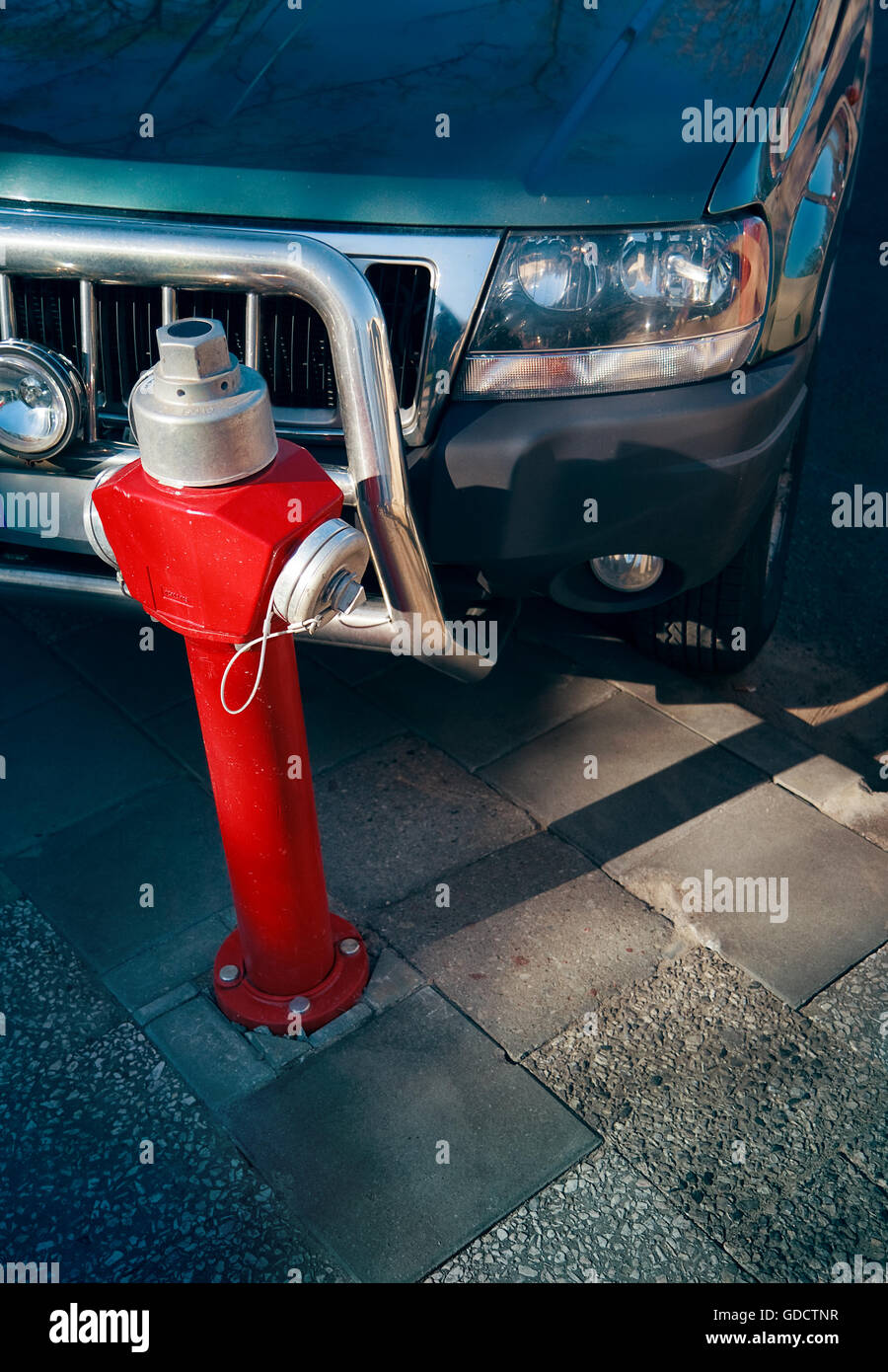 Red  fire hydrant, wrong parking Stock Photo