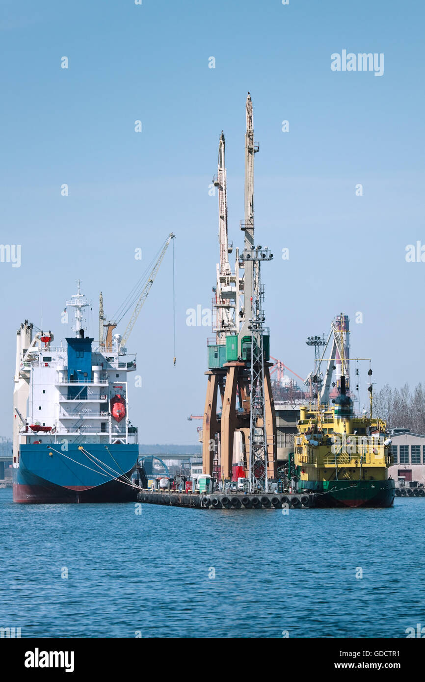Ships and cargo loading cranes Stock Photo